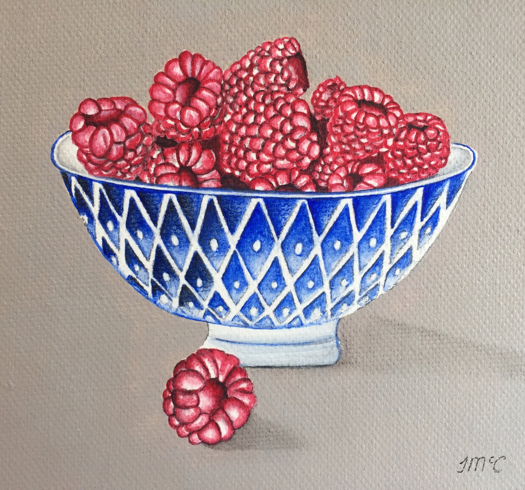Blue bowl of Raspberries